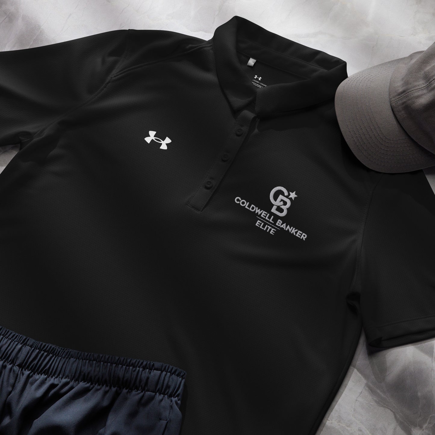 CBE Monogram Logo Under Armour® women’s polo