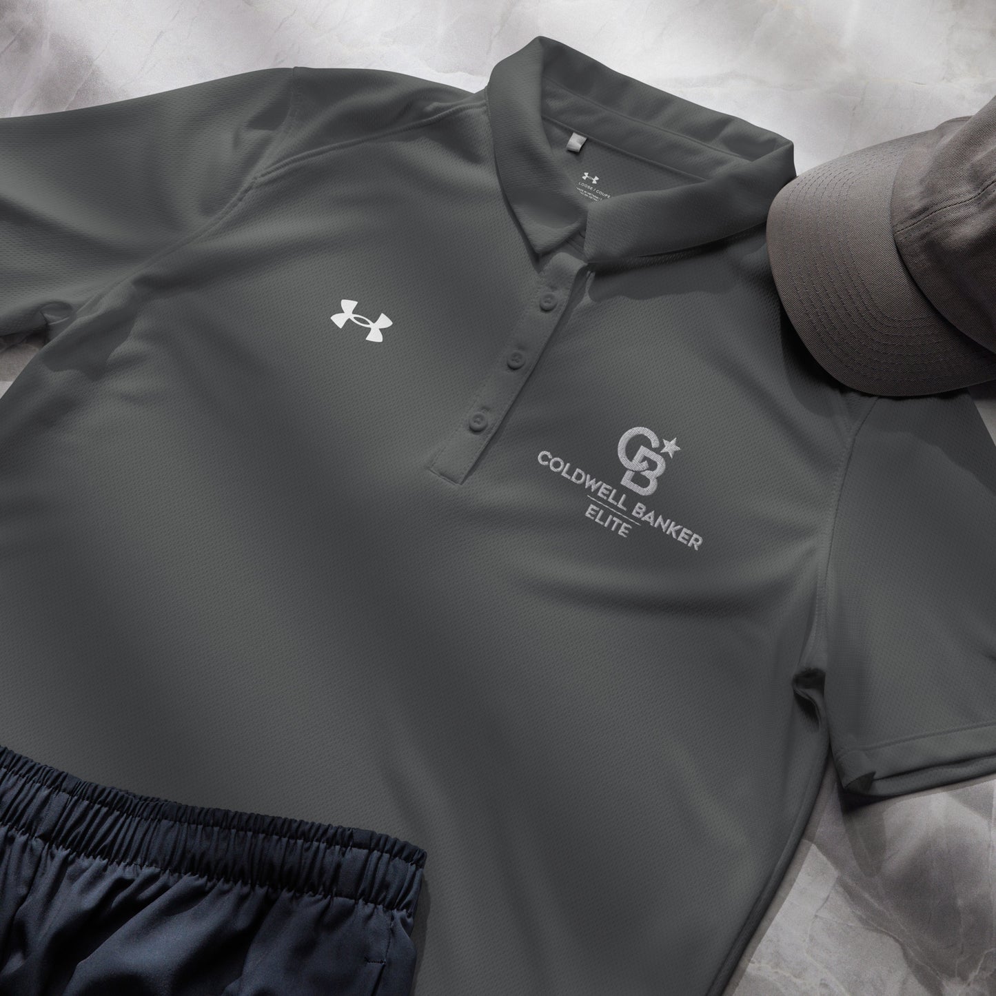 CBE Monogram Logo Under Armour® women’s polo