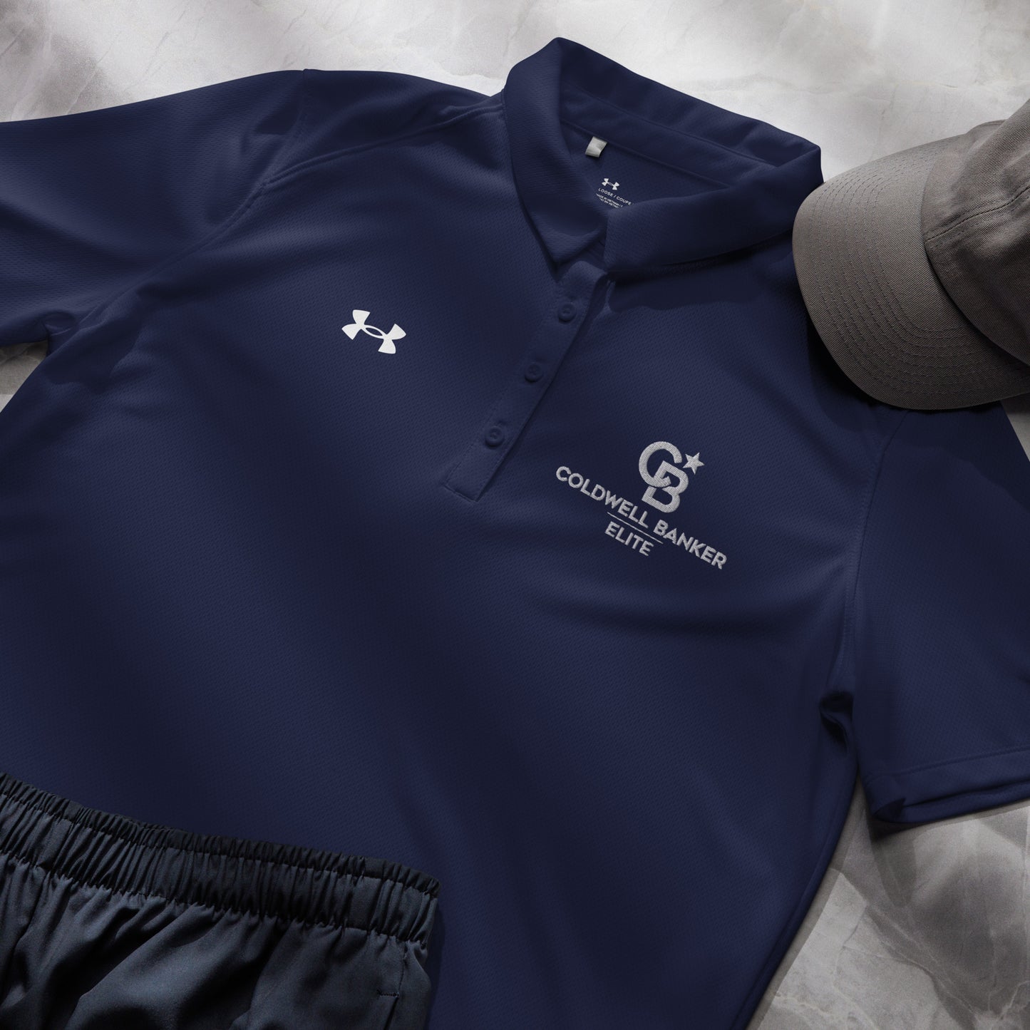 CBE Monogram Logo Under Armour® women’s polo